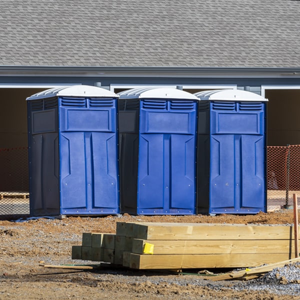 what is the cost difference between standard and deluxe portable restroom rentals in Dodgeville WI